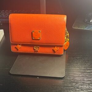 MCM lion edition Bold Orange Leather wallet with charms
